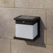 Philips LED-solcellelampe til væg Diara, sort, med sensor, IP44