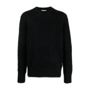 Sort sweater med hvide pile