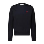 Sweater med logo broderi