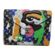 Pre-owned Canvas clutches