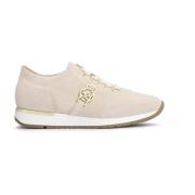 Damer beige ruskind sneakers dekoreret med et monogram